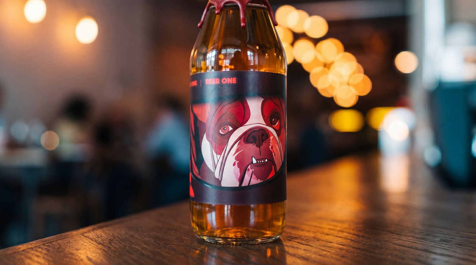 Year One Beer One bottle on a bar, wax-dipped top
